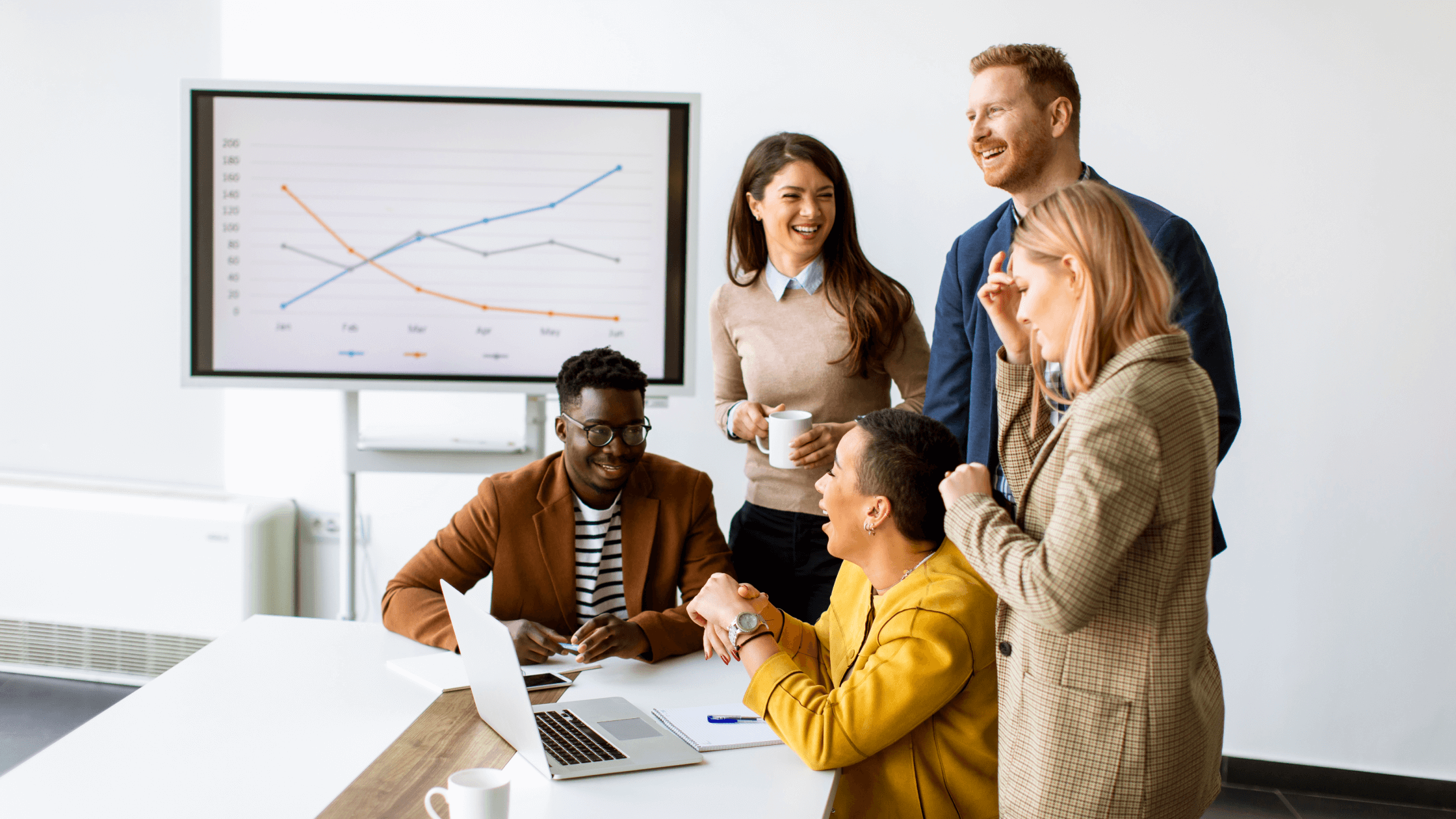 Happy team because of a successful business