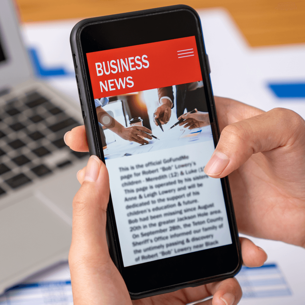 Reading a business news on mobile