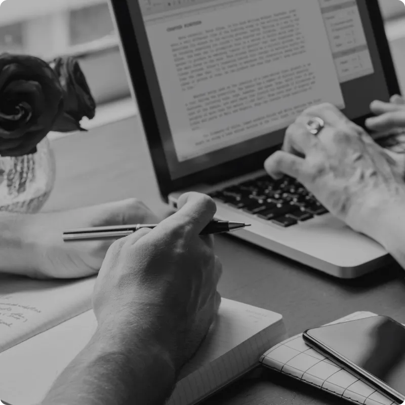 A man and a woman writing a content 2